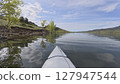 spring kayaking or canoeing on Horsetooth Reservoir at foothills of Rocky Mountains near Fort Collins, Colorado - POV paddler perspective 127947544