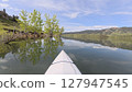 spring kayaking or canoeing on Horsetooth Reservoir at foothills of Rocky Mountains near Fort Collins, Colorado - POV paddler perspective 127947545