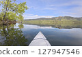 spring kayaking or canoeing on Horsetooth Reservoir at foothills of Rocky Mountains near Fort Collins, Colorado - POV paddler perspective 127947546