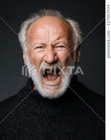 An angry, white-haired old man 127947934