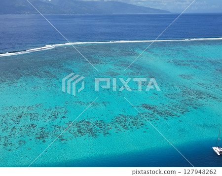 Aerial view of the coastline of the lagoon of Moorea, Tahiti Aerial view of the coastline of the lagoon of Moorea, Tahiti 127948262