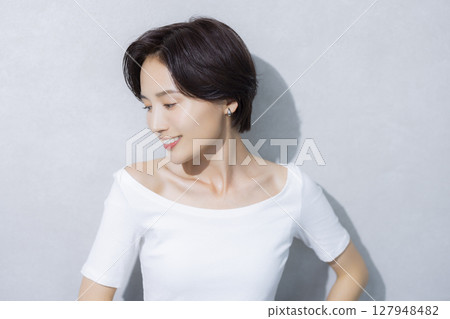 A woman with short hair A woman with short hair 127948482