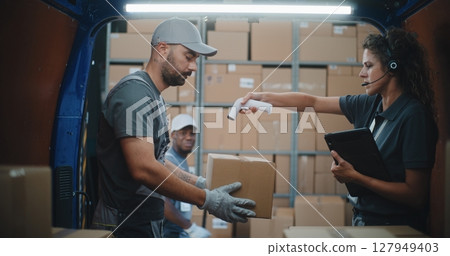 Logistics Distribution Warehouse: Diverse Employees Unloading Delivery Truck with Cardboard Boxes Logistics Distribution Warehouse: Diverse Employees Unloading Delivery Truck with Cardboard Boxes 127949403