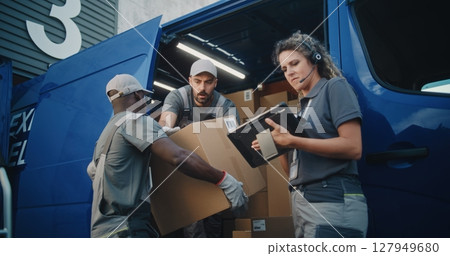 Multiethnic Workers Loading Cardboard Boxes with Online Orders, E-Commerce Goods in Delivery Truck Multiethnic Workers Loading Cardboard Boxes with Online Orders, E-Commerce Goods in Delivery Truck 127949680