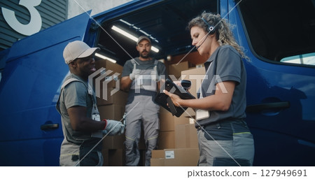 Employees Loading Delivery Truck with Cardboard Boxes. Female Manager Using Digital Tablet and Scanner 127949691