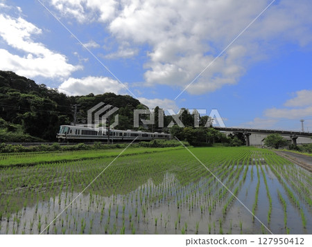 A train running through the countryside A train running through the countryside 127950412