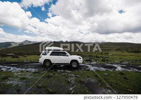 Toyota 4runner on high altitude mountain top in shichuan ,China Toyota 4runner on high altitude mountain top in shichuan ,China 127950479