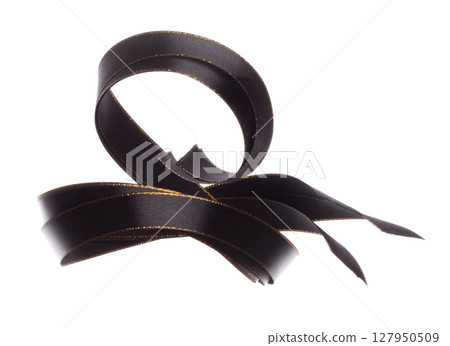 Black ribbon long straight fly in air with curve roll shiny. Black ribbon for present gift birthday party to wrap around decorate and curl curve long straight. White background isolated Black ribbon long straight fly in air with curve roll shiny. Black ribbon for present gift birthday party to wrap around decorate and curl curve long straight. White background isolated 127950509