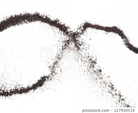 Coffee powder fly explosion, Coffee crushed ground float pouring, wave like smoke smell. Coffee ground powder splash throwing in mid Air. White background Isolated high speed shutter, freeze motion 127950519