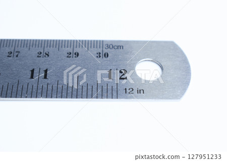 metal ruler isolated on white background, object for education metal ruler isolated on white background, object for education 127951233