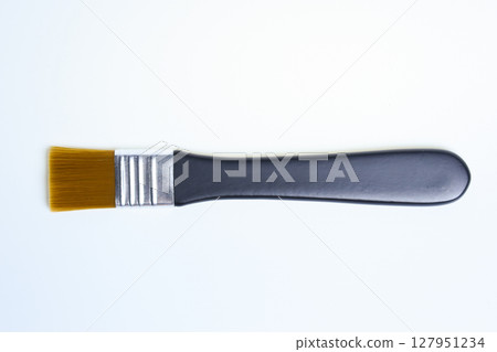 single paintbrush isolated on white background, object for art work 127951234