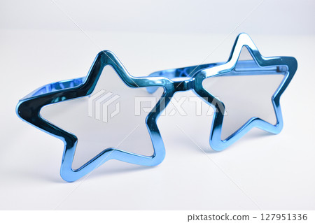 blue star shape of glasses on white background blue star shape of glasses on white background 127951336