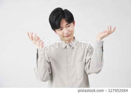 Male surrender, 20s, white background 127952084