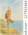 Watercolor illustration of a woman doing yoga on a cliff by the sea 127952468