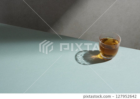 Minimal Aesthetic Beverages in Natural Light with Greenery. Minimal Aesthetic Beverages in Natural Light with Greenery. 127952642