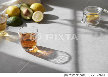Minimal Aesthetic Beverages in Natural Light with Greenery. Minimal Aesthetic Beverages in Natural Light with Greenery. 127952661