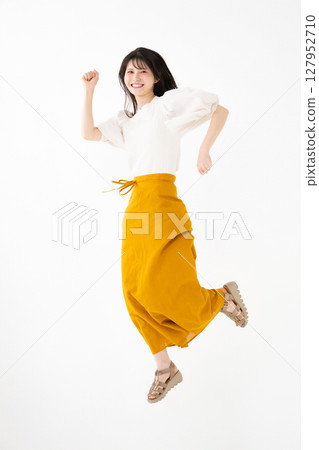 jumping woman jumping woman 127952710