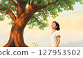 Thai woman in simple traditional dress standing under the tree 127953502