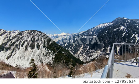Spring tourist attraction: snowy scenery of the Tateyama mountain range on the Tateyama Kurobe Alpine Route Spring tourist attraction: snowy scenery of the Tateyama mountain range on the Tateyama Kurobe Alpine Route 127953634