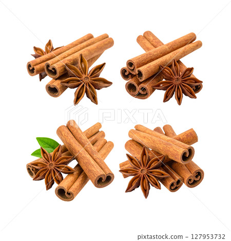 Aromatic brown cinnamon sticks and star anise are sweet spice ingredients for food on white background. Aromatic brown cinnamon sticks and star anise are sweet spice ingredients for food on white background. 127953732
