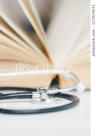 Concept business education essential idea globalization, student learn and study in university and colleges to master knowledge needed travel global economy. book stethoscope for medical health care Concept business education essential idea globalization, student learn and study in university and colleges to master knowledge needed travel global economy. book stethoscope for medical health care 127954031