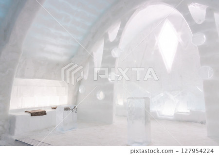 Inside the ice bar made from ice blocks from Lake Shikaribetsu Kotan in Shikaoi Town, Hokkaido 127954224