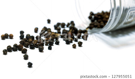 Black pepper isolated on a white background Black pepper isolated on a white background 127955051