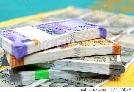 piles of new indian currency notes rupees 50,100,200 and 50\ piles of new indian currency notes rupees 50,100,200 and 50\ 127955059