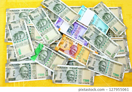 piles of new indian currency notes rupees 50,100,200 and 50\ piles of new indian currency notes rupees 50,100,200 and 50\ 127955061