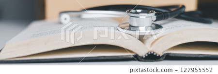 Concept business education essential idea globalization, student learn and study in university and colleges to master knowledge needed travel global economy. book stethoscope for medical health care Concept business education essential idea globalization, student learn and study in university and colleges to master knowledge needed travel global economy. book stethoscope for medical health care 127955552