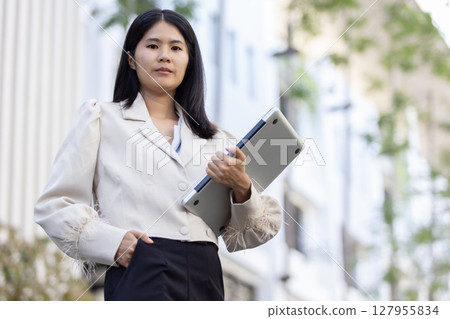 Future remote work combines technology smart phone connection online white digital business woman enable e-learning productivity while travel blend comfort modern devices serenity computer equipment 127955834