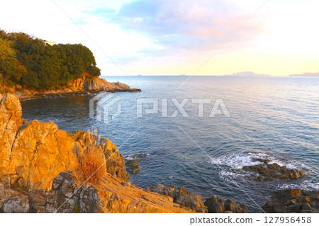 Evening view of Cape Moburihana in Murozu, a retro port town in Harima, and the Ieshima Islands in the distance / Setonaikai National Park 127956458