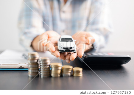 Concept businessman vehicle finance protection office plan investment protect hand save buy sell car ensuring idea financial security automobile agent purchase insurance secure favorable loan deal Concept businessman vehicle finance protection office plan investment protect hand save buy sell car ensuring idea financial security automobile agent purchase insurance secure favorable loan deal 127957180