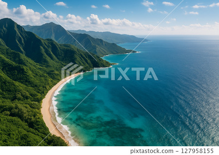 A tropical coastline with emerald green seas and green mountains 127958155