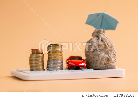 Concept business vehicle finance protection office plan investment buy sell coin car ensuring idea financial security. automobile agent tax protect purchase insurance and secure favorable loan deal Concept business vehicle finance protection office plan investment buy sell coin car ensuring idea financial security. automobile agent tax protect purchase insurance and secure favorable loan deal 127958165