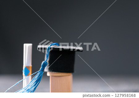 Concept education is business scholarship essential idea globalization, mortarboard students learn and study in universities and colleges master knowledge save involves financial management diploma 127958168
