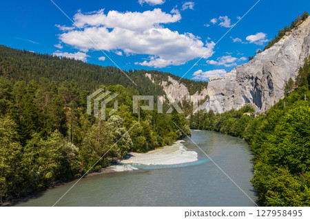 View of Ruinaulta, also known as the Rhine Gorge, or sometimes called the Swiss Grand Canyon in Grisons (Graubunden) canton, Switzerland 127958495