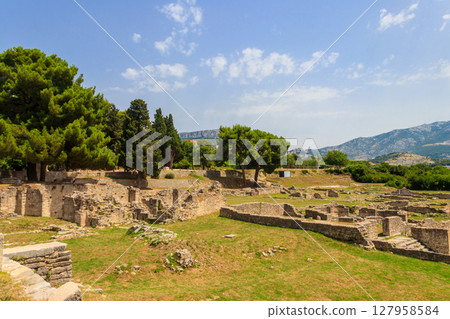 Remains of the old Roman town of Salona, an archaeological site located in the town of Solin, near Split in Dalmatia Region, Croatia 127958584