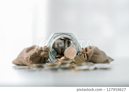 Business save money coin growth concept involves strategic financial management investment loan bank real estate economic development encourage buy income stack investment economy return accountancy 127958627