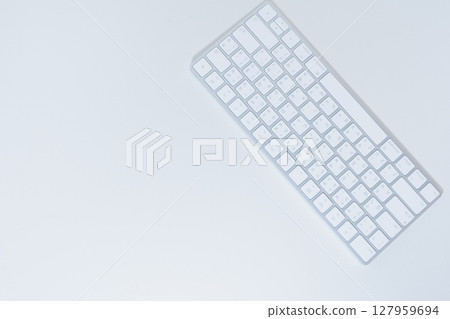 flat lay work and learn online in new normal concept from wireless keyboard on white isolated background 127959694