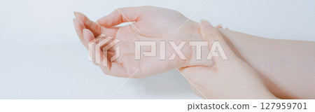 massage hand and finger after pain and ache in office working with white isolated background massage hand and finger after pain and ache in office working with white isolated background 127959701