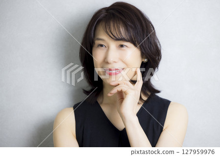 Beautiful middle-aged woman 127959976