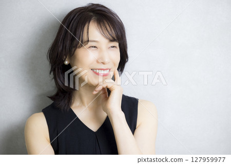 Beautiful middle-aged woman 127959977