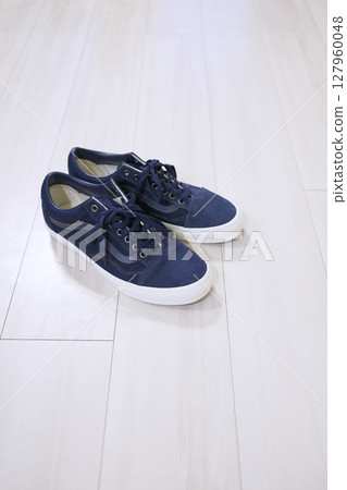 Blue shoes vertical 127960048