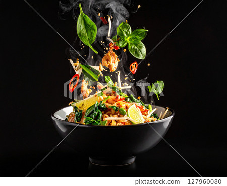 AI generated sizzling thai pad pak boong fai daeng with fresh ingredients falling into ornate thai bowl crispy water spinach garlic chili oyster sauce AI generated sizzling thai pad pak boong fai daeng with fresh ingredients falling into ornate thai bowl crispy water spinach garlic chili oyster sauce 127960080