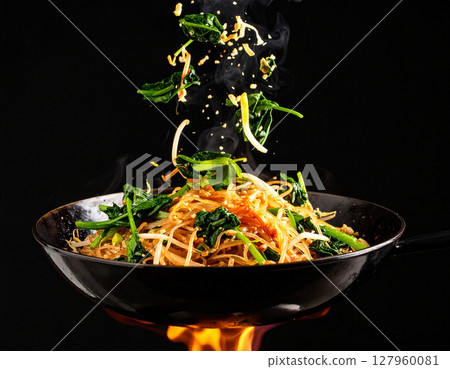 AI generated sizzling thai pad pak boong fai daeng with fresh ingredients falling into ornate thai bowl crispy water spinach garlic chili oyster sauce 127960081
