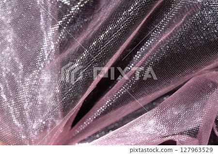 Close up of pink organza silk fabric in delicate waves for background 127963529
