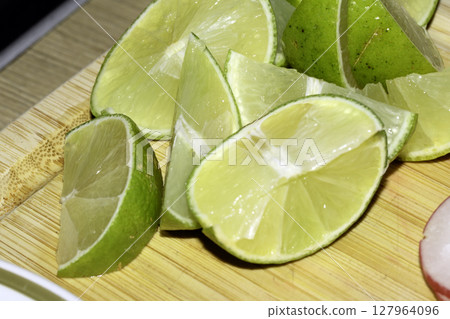 Close Up of Lime Slice and Segments Fruit Juicy 127964096