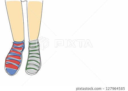 Single one line drawing different stripes between right and left. Comfort comes first, differences are a matter of taste. Colorful socks. Anti Bullying Day. Continuous line design graphic illustration 127964585