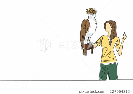 Single continuous line drawing Philippine eagle perched on hand of woman. Has pointed crown feathers known as crests. Has a large curved beak. Woman Holding Bird. One line design vector illustration 127964813